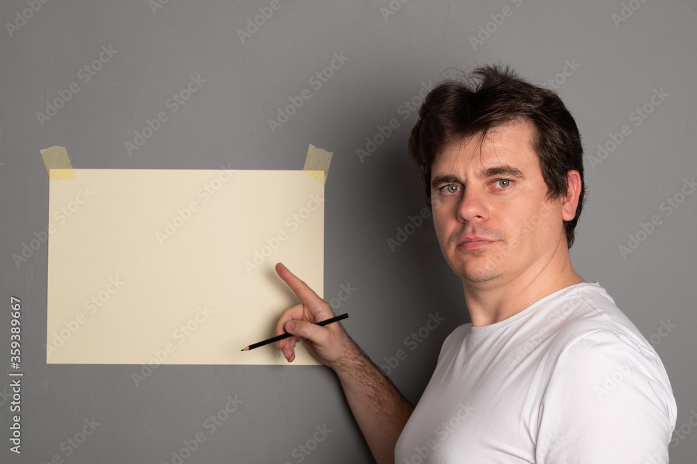 Man makes business presentation with pen. Empty space for text. Man makes business presentation with pen. Empty space for text.