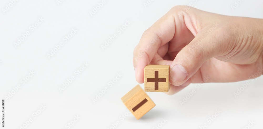 Concept creative idea  innovation. wooden cube block in hand with symbol