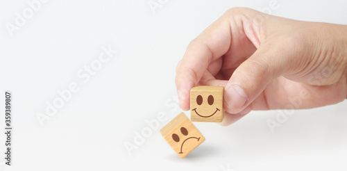Concept creative idea innovation. wooden cube block in hand with symbol