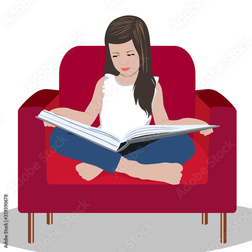 Little girl reads a book and sits on a armchair. Distance learning. Home education. School girl girl doing homework. Child with a book in her hands. Bookcrossing.