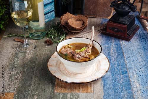 Soup with lamb ribs celery spinach and potatoes photo