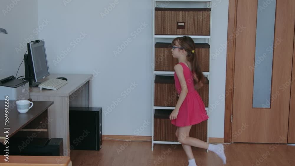 Little girl taking online classes at home during covid 19 epidemic Little girl taking online classes at home during covid 19 epidemic