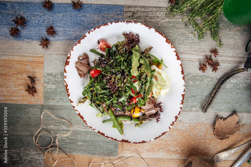 Appetizing warm salad with beef greens Appetizing warm salad with beef greens