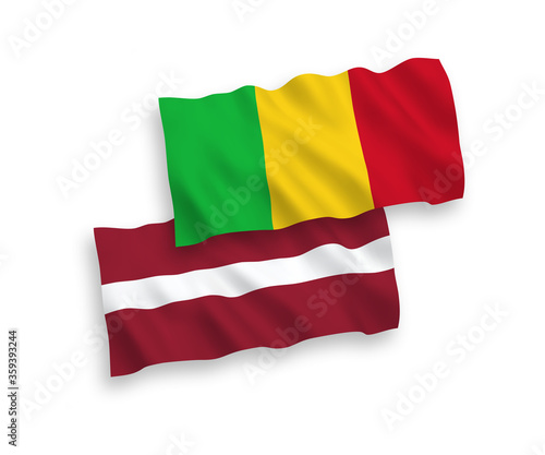 Flags of Latvia and Mali on a white background