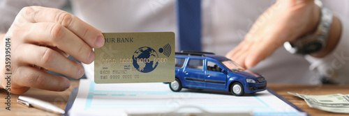 Agent offers to buy car credit card and clearance. Purchase and registration vehicle. Execution documents confirming ownership rights. Acceptance transfer deed supported by dealers signature