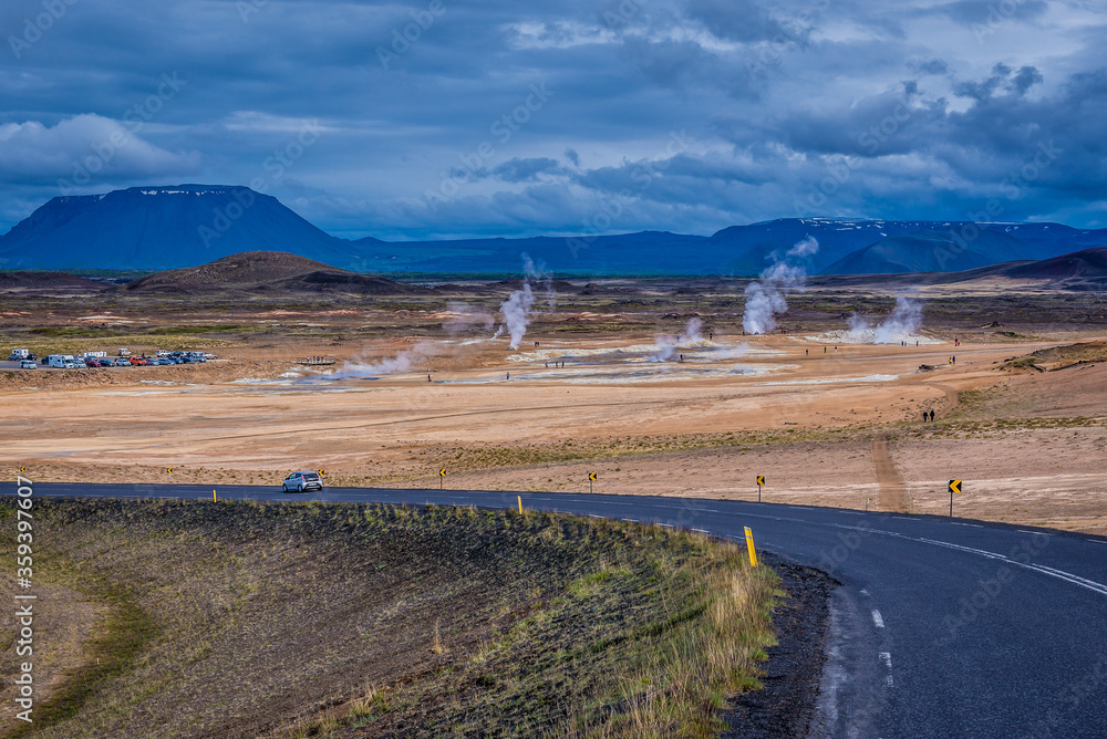 View from so called Ring Road on Hverir geothermal area with boiling mudpools and steaming fumaroles near Reykjahlid town Iceland View from so called Ring Road on Hverir geothermal area with boiling mudpools and steaming fumaroles near Reykjahlid town Iceland