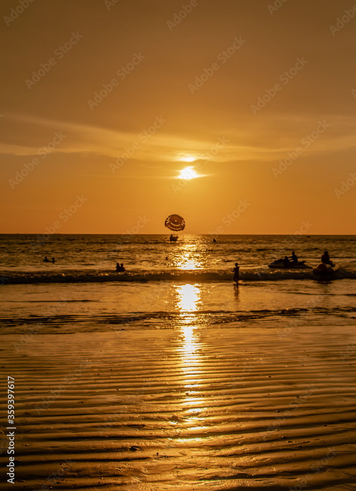 people look sunset on the beach