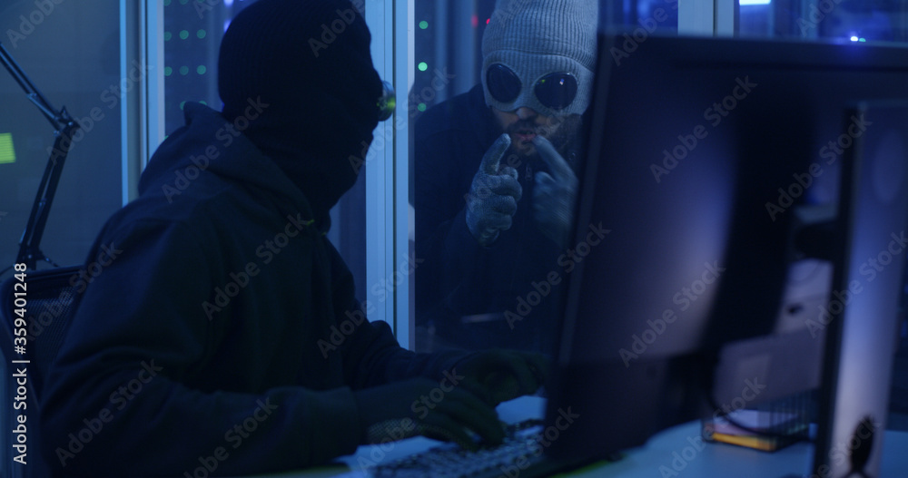 Hackers breaking into a data center Hackers breaking into a data center