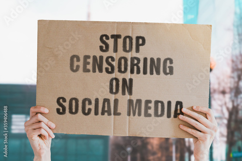 Canvas Print The question  Stop censoring on social media  on a banner in men's hand with blurred background