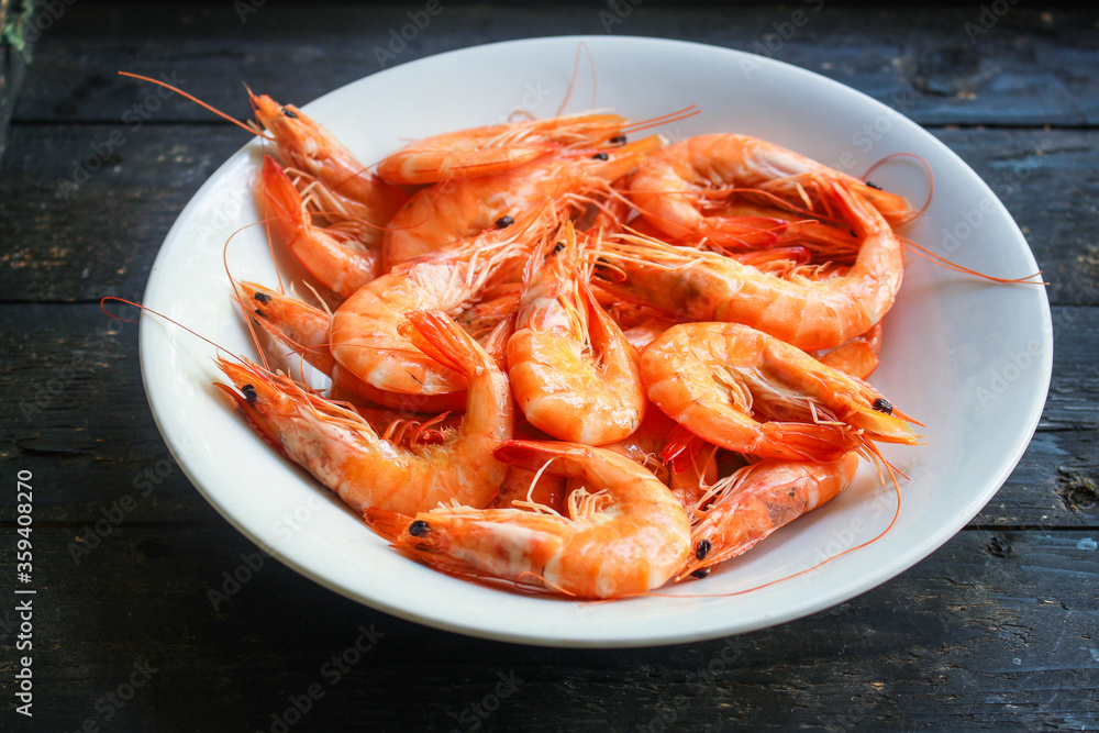 shrimp prawn ready to eat boiled seafood Menu concept serving size. food background top view copy space for text keto or paleo pescatarian diet shrimp prawn ready to eat boiled seafood Menu concept serving size. food background top view copy space for text keto or paleo pescatarian diet
