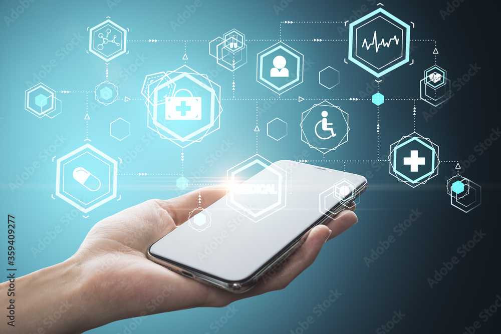 Hand holding smartphone with glowing medical interface Hand holding smartphone with glowing medical interface