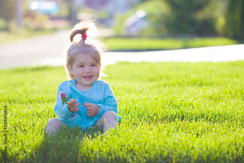 baby little child beautiful girl crying emotion sadness summer lawn at home baby little child beautiful girl crying emotion sadness summer lawn at home