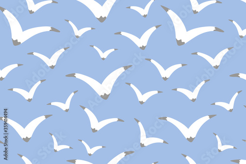 Light blue vector seamless pattern with seagulls. Flying birds illustration for fabric, textile, banner, calendar, wallpaper, background, cover, wrapping paper