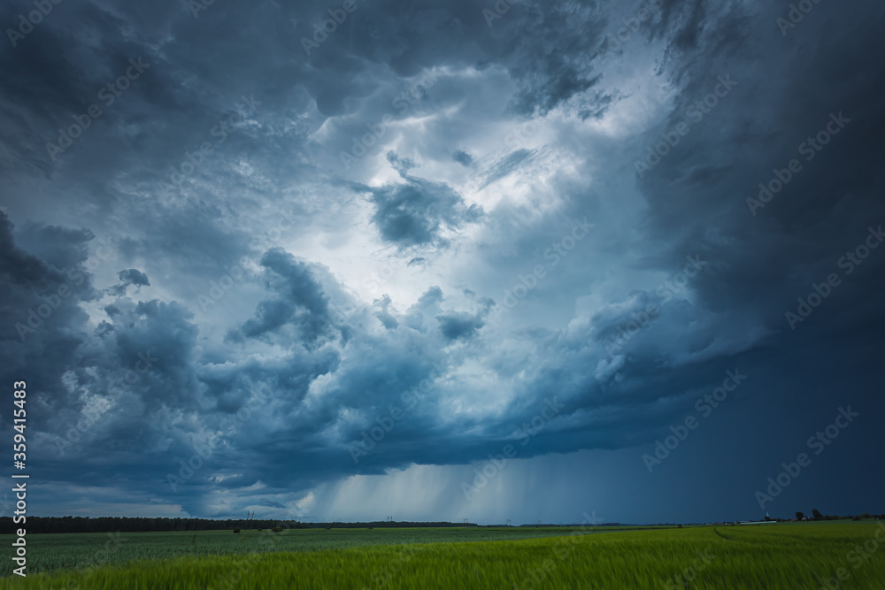Supercell storm clouds with intense tropic rain Supercell storm clouds with intense tropic rain
