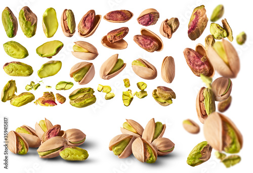 Obraz na płótnie A set with Fresh raw Pistachios isolated on white background.