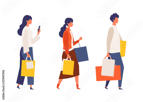 People carrying shopping bags at autumn. Man and woman taking part in seasonal sale at store, shop, mall.