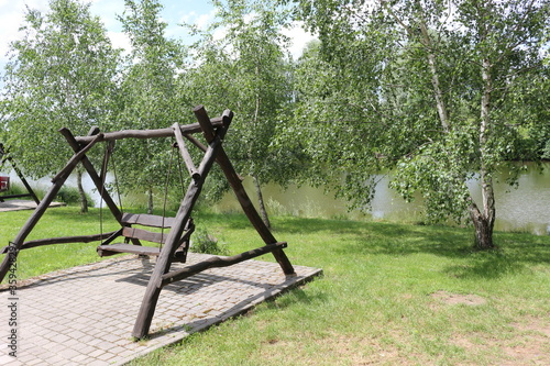 Wallpaper Mural The recreation center in ethno style is a favorite vacation spot in Ukraine. Children and adults love to ride wooden swings. Torontodigital.ca