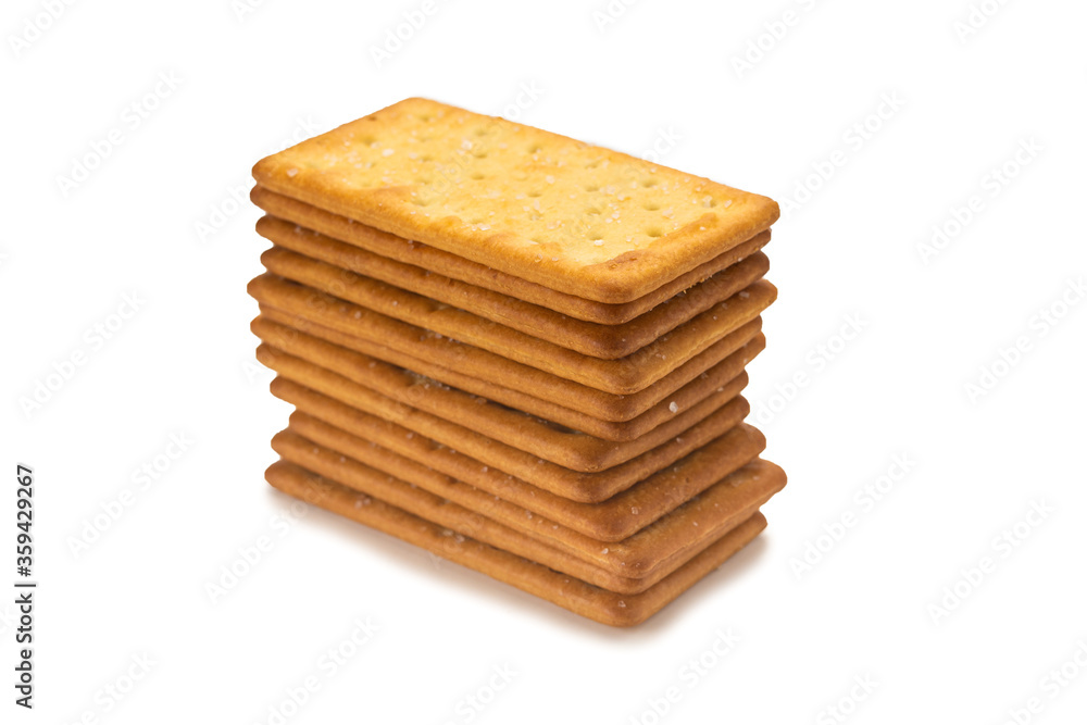 Cracker with salt isolated on white. Cracker with salt isolated on white.