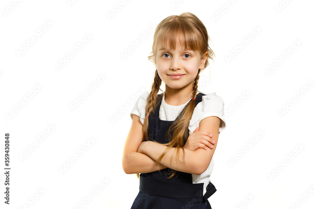 Little Funny girl in shirt. Isolated on white background. Baby girl in school. The child girl with textbooks. Girl studing. Little Funny girl in shirt. Isolated on white background. Baby girl in school. The child girl with textbooks. Girl studing.