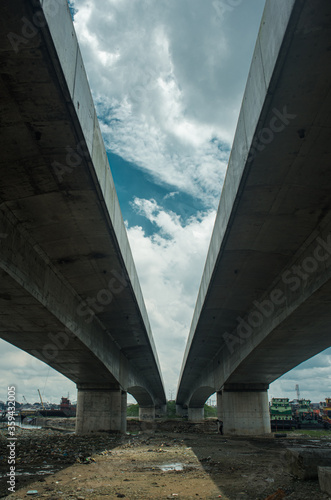 An image showing underneath an overhead bridge 
