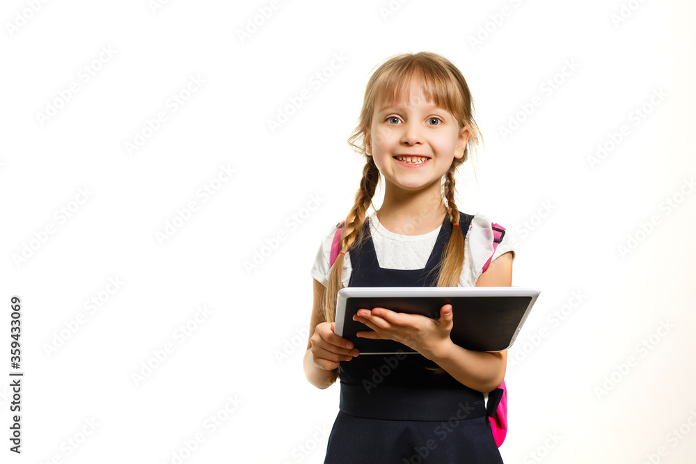 little blond school girl with backpack bag portrait isolated on white background