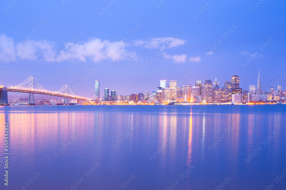 City skyline across the bay at dawn, San Francisco, California, United States