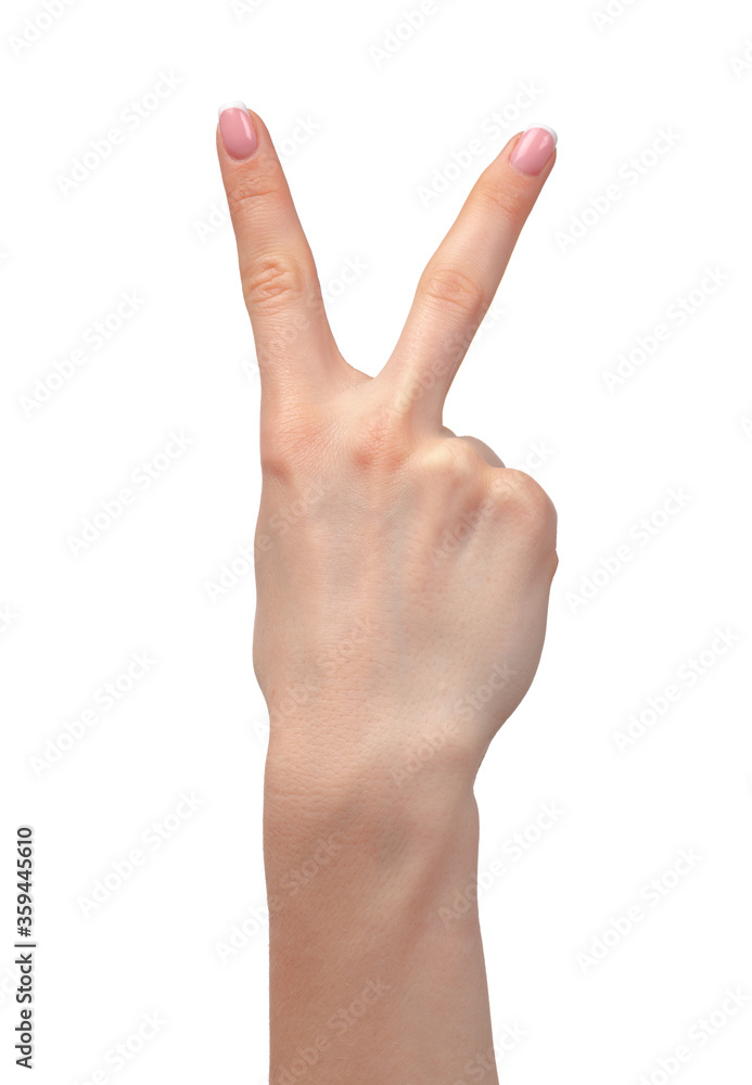 Female hand showing two fingers isolated on white Female hand showing two fingers isolated on white