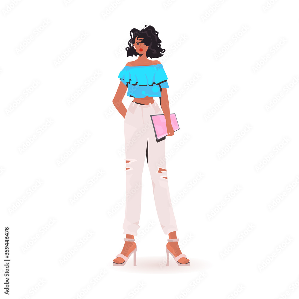 african american woman holding tablet pc beautiful girl model in trendy clothes female cartoon character standing pose full length isolated vector illustration african american woman holding tablet pc beautiful girl model in trendy clothes female cartoon character standing pose full length isolated vector illustration
