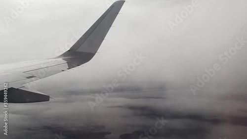 airplane in the clouds with turbulence
