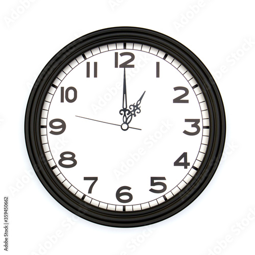 Black round analog wall clock isolated on white background, its one oclock.