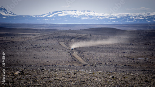 The mountain road Kjalvegur (Road F35), deep inside the central highlands of Iceland.  The gravel road lies through a pass between two large glaciers. 