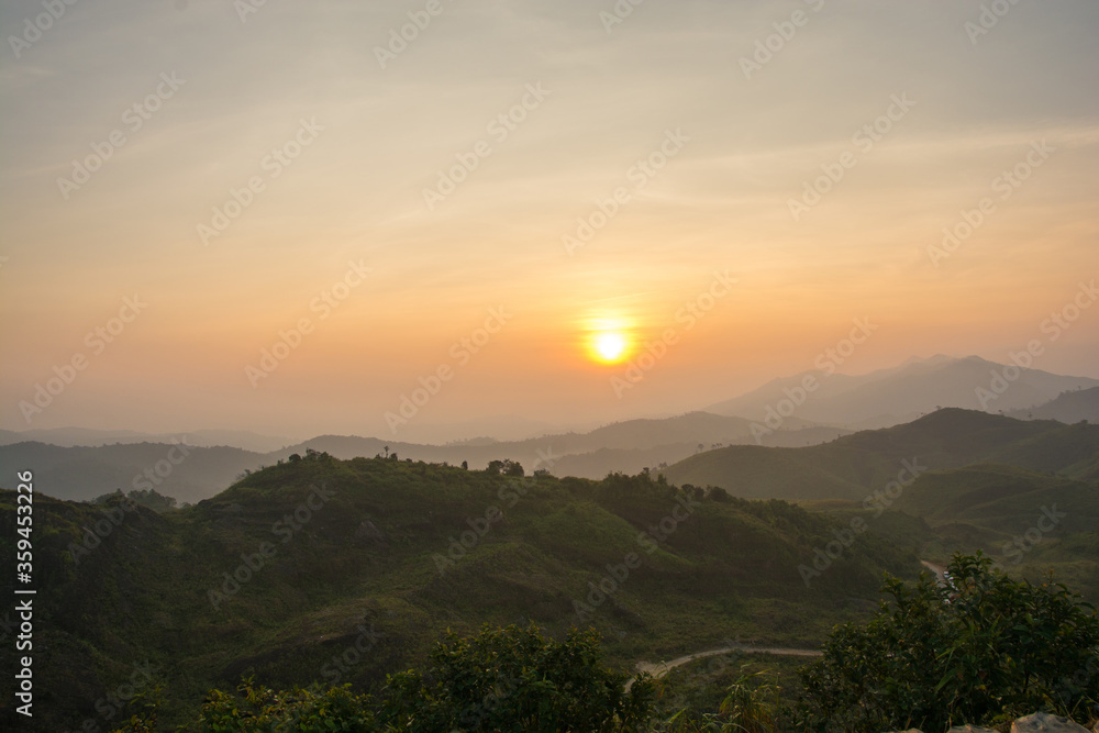 Fototapeta premium Landscape sunrise with mountain in the pilok , Kanchanaburi , Thailand