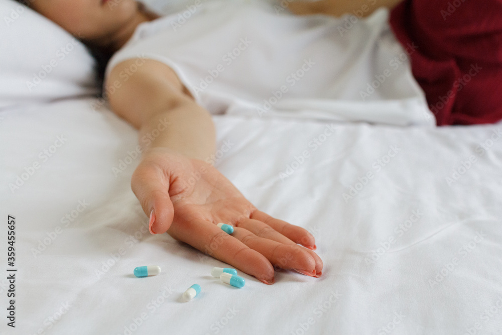 Close up of woman hand with many pills. Drug addiction and social issue for teenager. Take an overdose concept Close up of woman hand with many pills. Drug addiction and social issue for teenager. Take an overdose concept