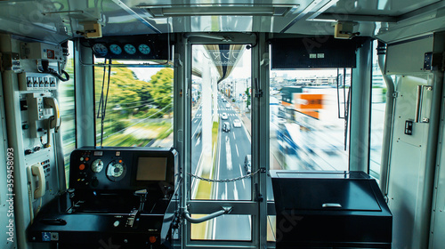 The suspened monorail system in Chiba, Japan, motion blurred view from inside the photo