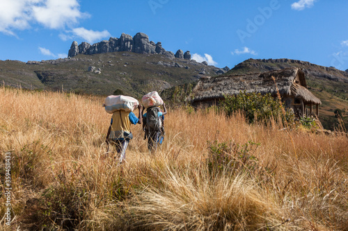 African men cary heavy bags photo