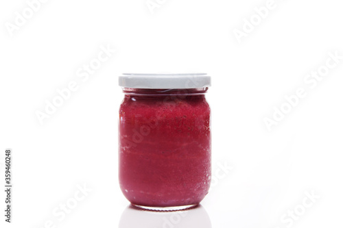 Nutrition concept - Healthy food, Diet, Detox, Clean Eating or Vegetarian concept. A nutritious food on glass jars against white background. Sauce in a glass bowl.