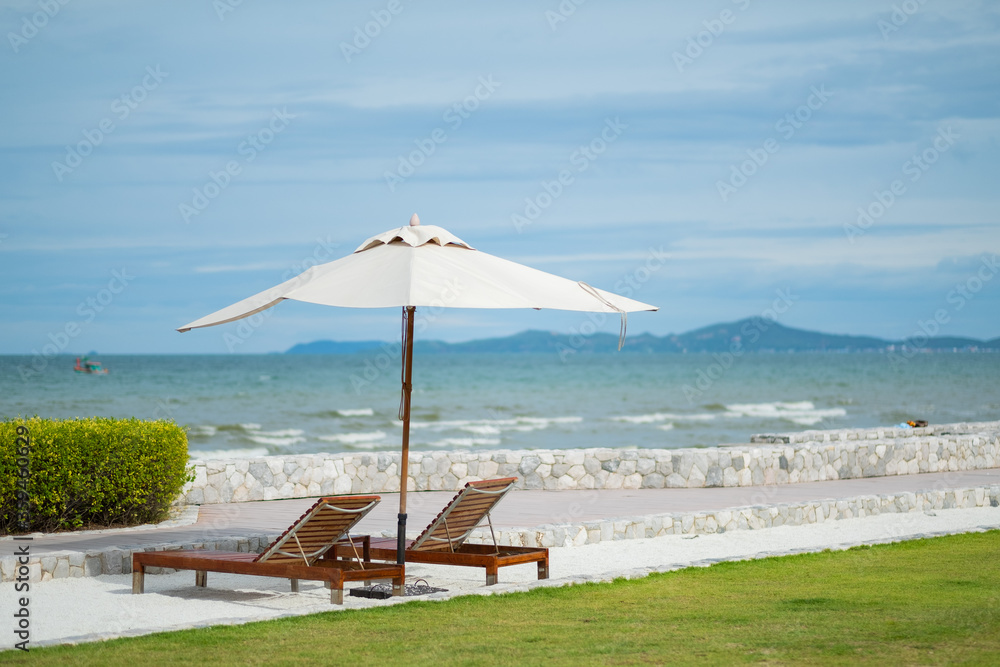 Fototapeta premium beach chair with umbrella, summer time, Vacation 