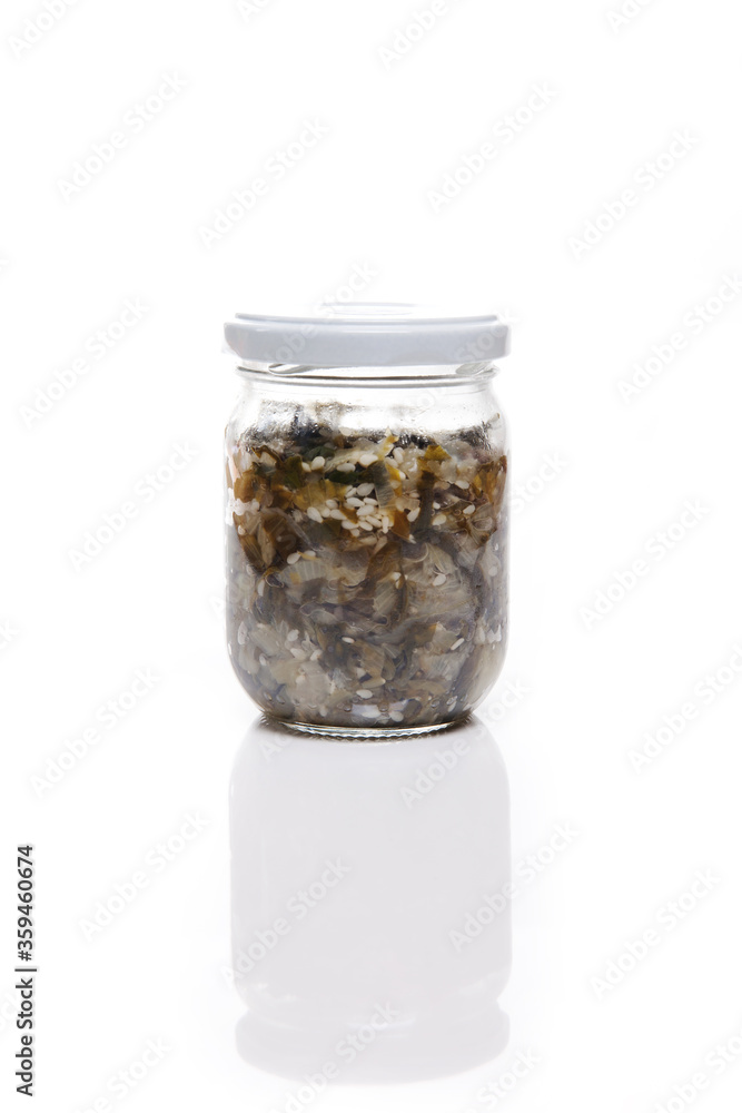 Nutrition concept - Healthy food, Diet, Detox, Clean Eating or Vegetarian concept. A nutritious food on glass jars against white background. Delicious salad in a glass jar. Nutrition concept - Healthy food, Diet, Detox, Clean Eating or Vegetarian concept. A nutritious food on glass jars against white background. Delicious salad in a glass jar.