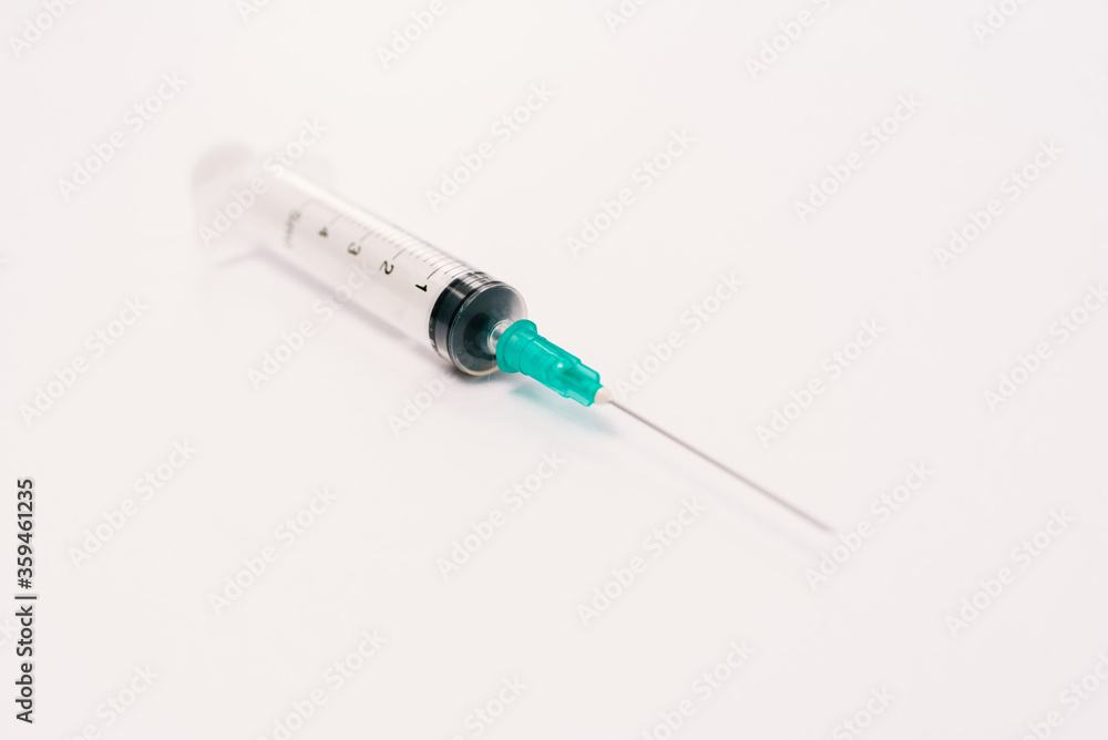 Syringe on a white background. Syringe on a white background.