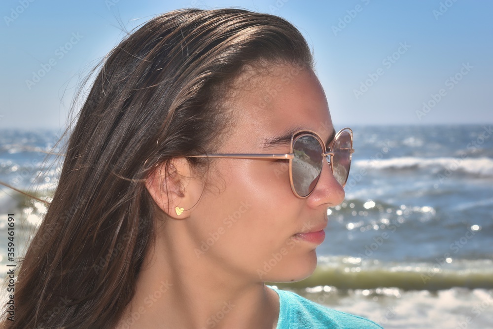woman wearing sunglasses woman wearing sunglasses