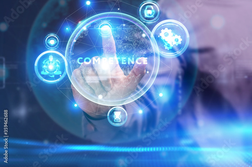 Business, Technology, Internet and network concept. Young businessman working on a virtual screen of the future and sees the inscription: Competence