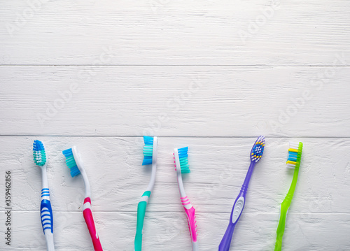 Various colorful plastic toothbrushes