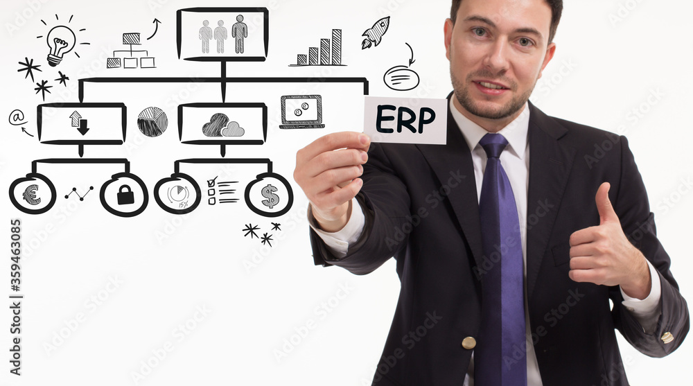 Business, technology, internet and network concept. Young businessman thinks over the steps for successful growth: ERP Business, technology, internet and network concept. Young businessman thinks over the steps for successful growth: ERP