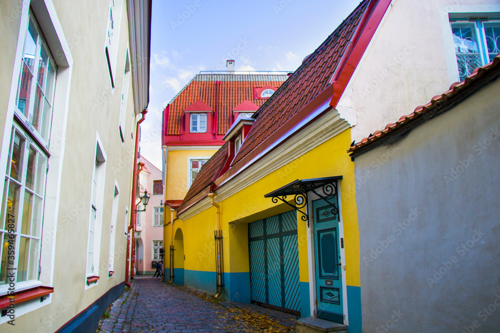Buildings and architecture exterior view in old town of Tallinn, colorful old style houses and street situation. Tallinn, Estonia.