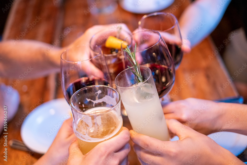 People toasting with drinks People toasting with drinks