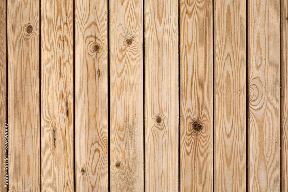 Wood texture background. Natural light brown wooden planks. Wood texture background. Natural light brown wooden planks.