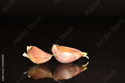 garlic on black background