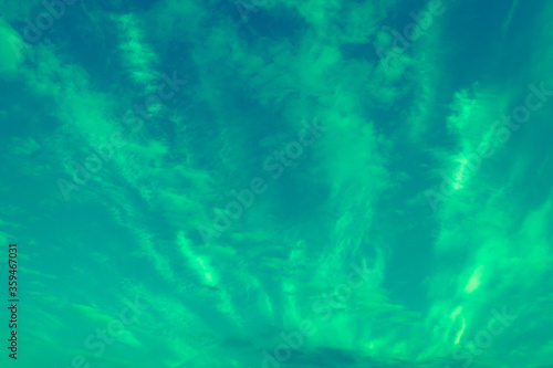 Background of turquoise cloudscape on blue sky