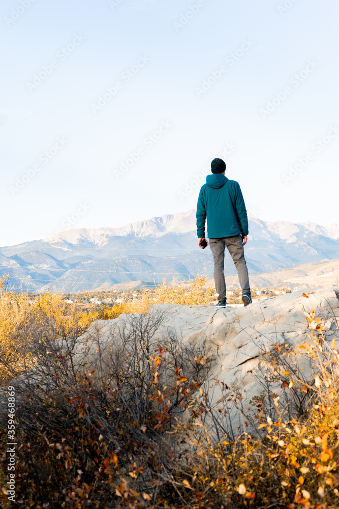 man walking in the mountains