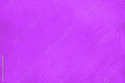 Abstract purple background in yellow. An empty yellow texture with a rough surface